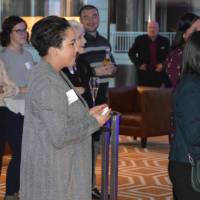 Alumni listening to T.Haas